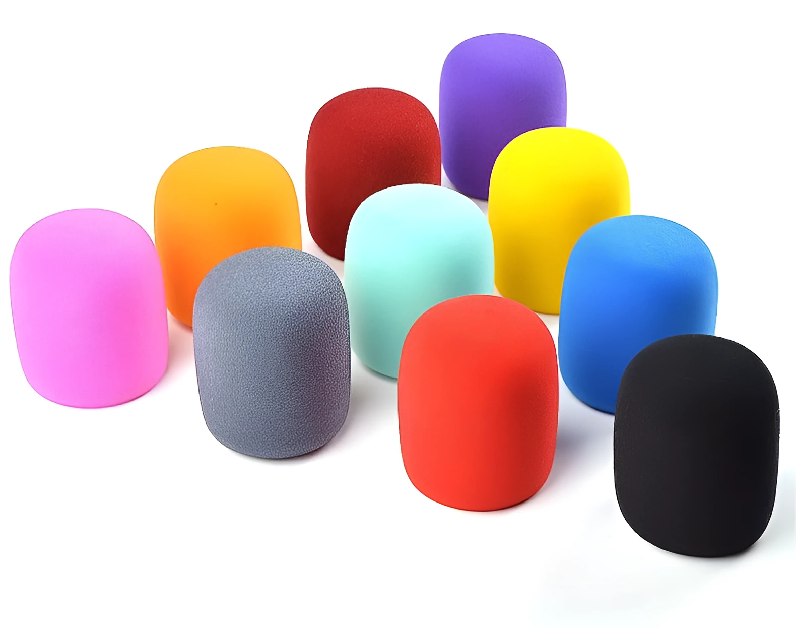 Four multicoloured foam microphone windshields for handheld stage microphones