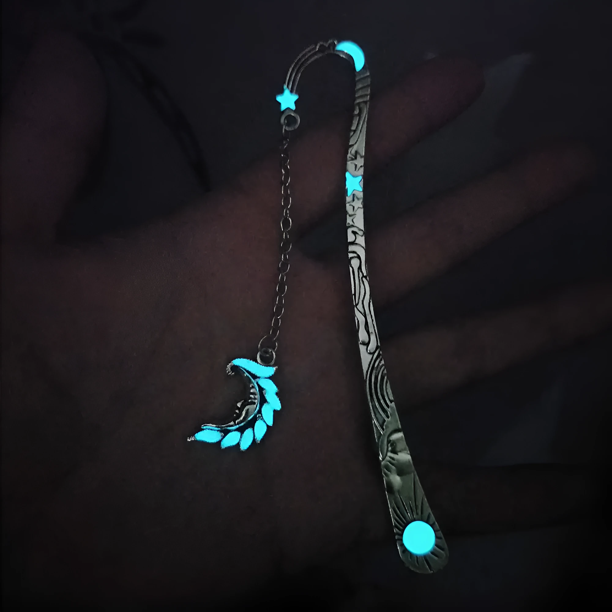 Retro five-pointed star glowing metal bookmark with celestial patterns in ancient silver or bronze finish