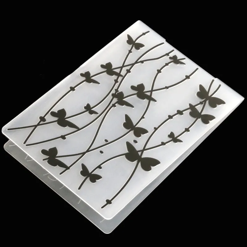 Plastic folding cake decorating mould showing windmill and five-pointed star design options