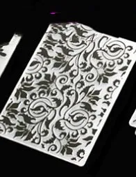 Plastic folding cake decorating mould showing windmill and five-pointed star design options