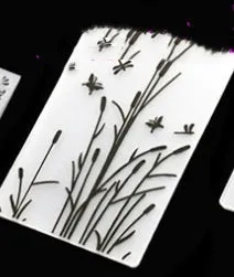 Plastic folding cake decorating mould showing windmill and five-pointed star design options