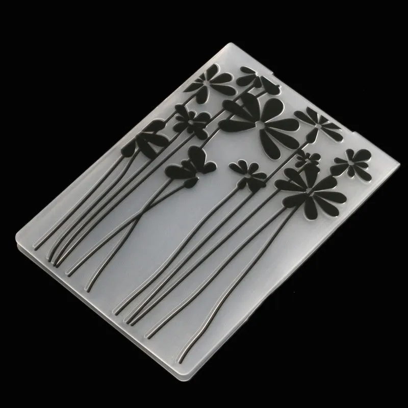 Plastic folding cake decorating mould showing windmill and five-pointed star design options