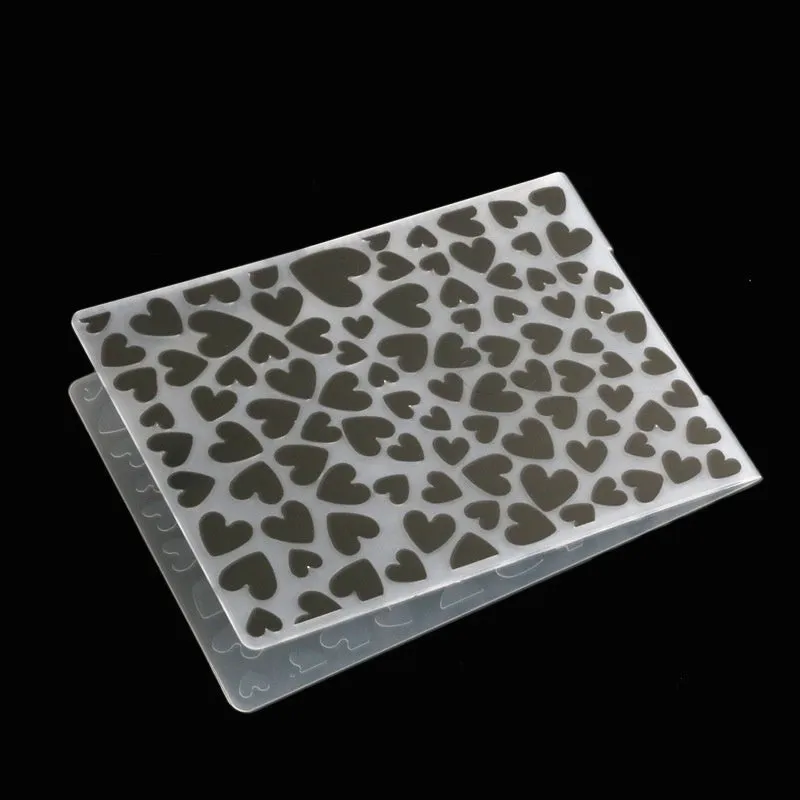 Plastic folding cake decorating mould showing windmill and five-pointed star design options