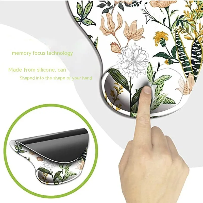 Black silicone keyboard pad with wrist strap featuring a floral pattern