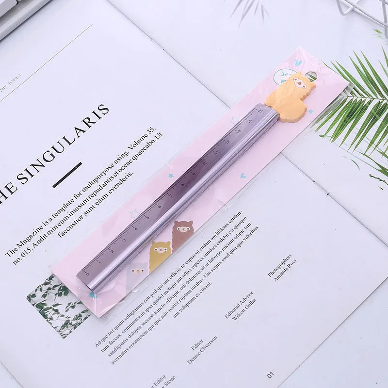 30 centimetre long silver aluminum ruler with black printed measurement scales.