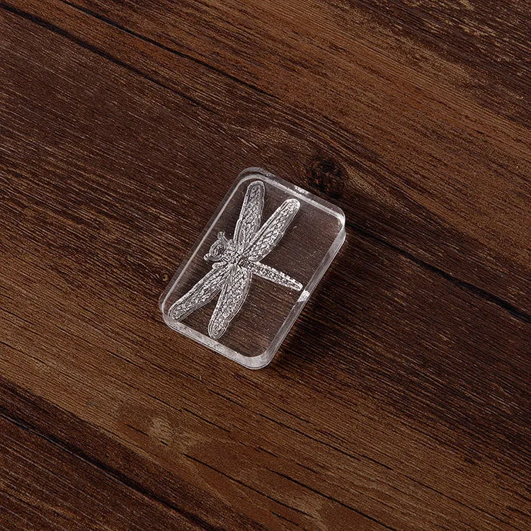 Transparent acrylic hand seal with 12mm height showing dragonfly or Fei Xue fern design options