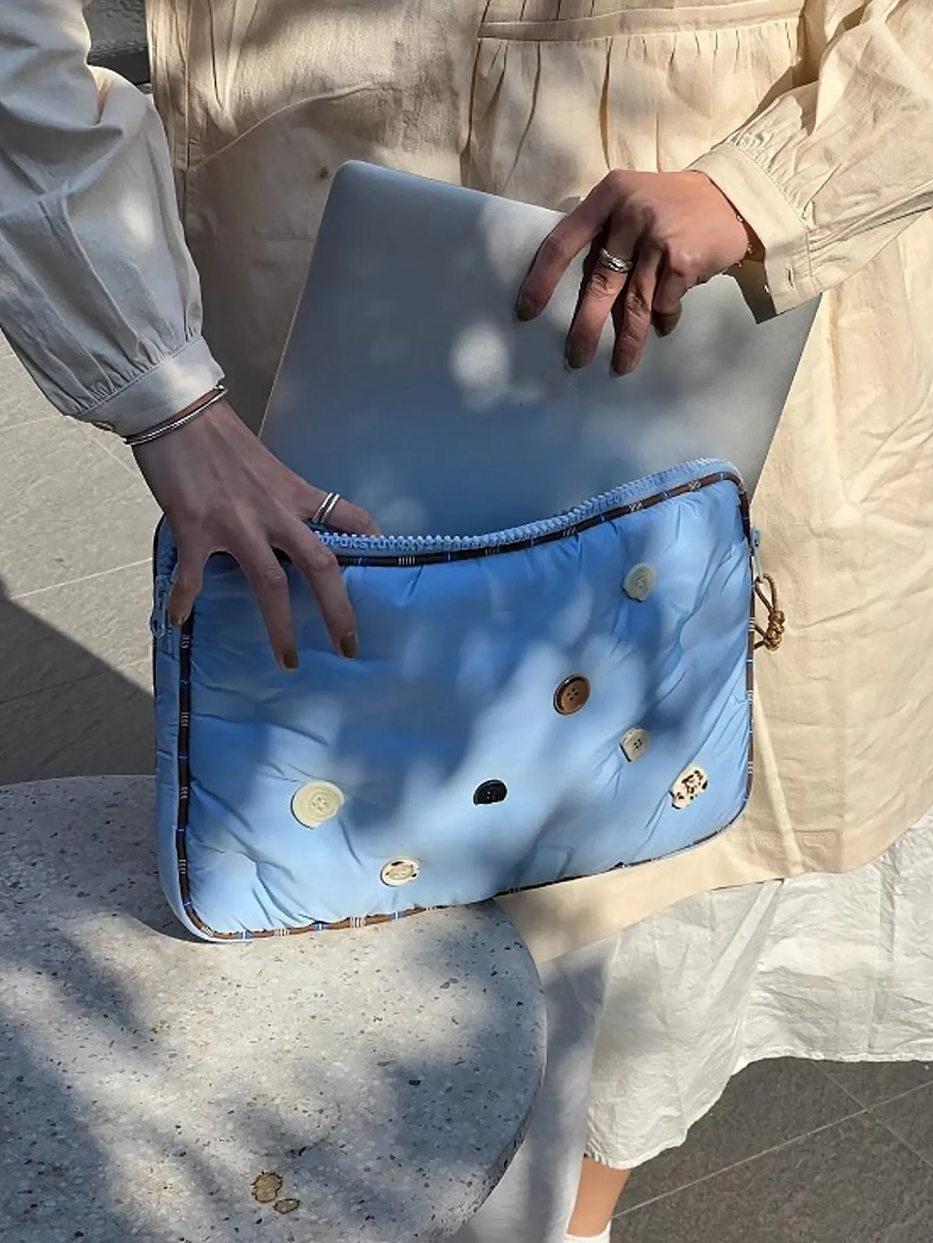 Blue plaid pattern nylon laptop sleeve case for a 14-inch computer, shown with a size tag.