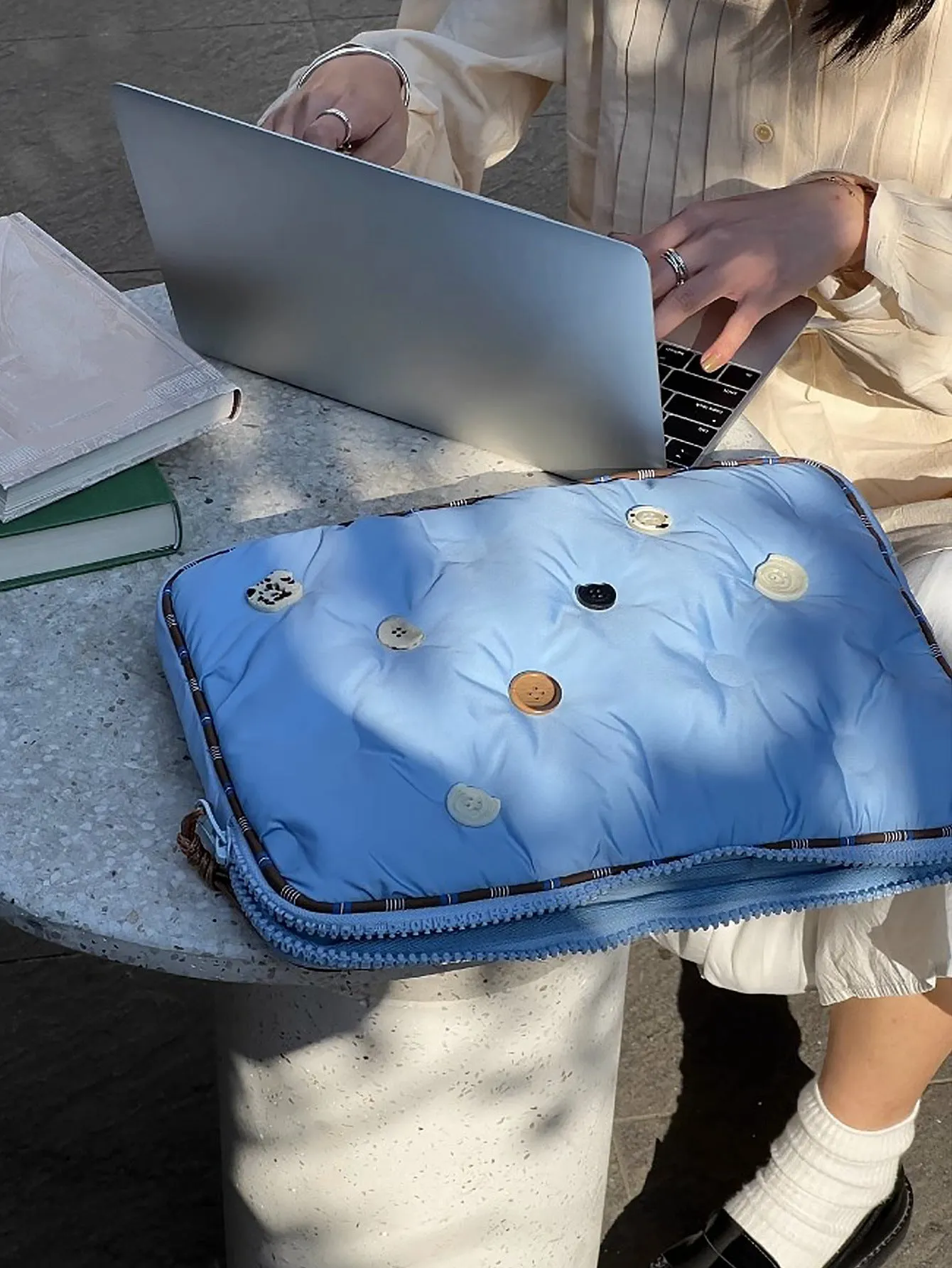 Blue plaid pattern nylon laptop sleeve case for a 14-inch computer, shown with a size tag.