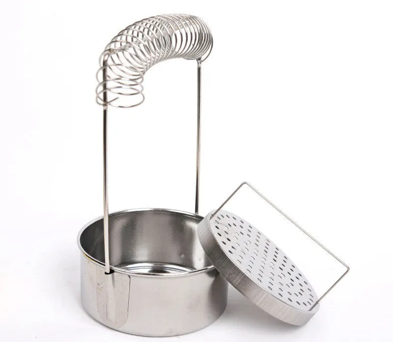 Silver stainless steel oil painting pen washer with a sprung metal clamp and leak plugs.