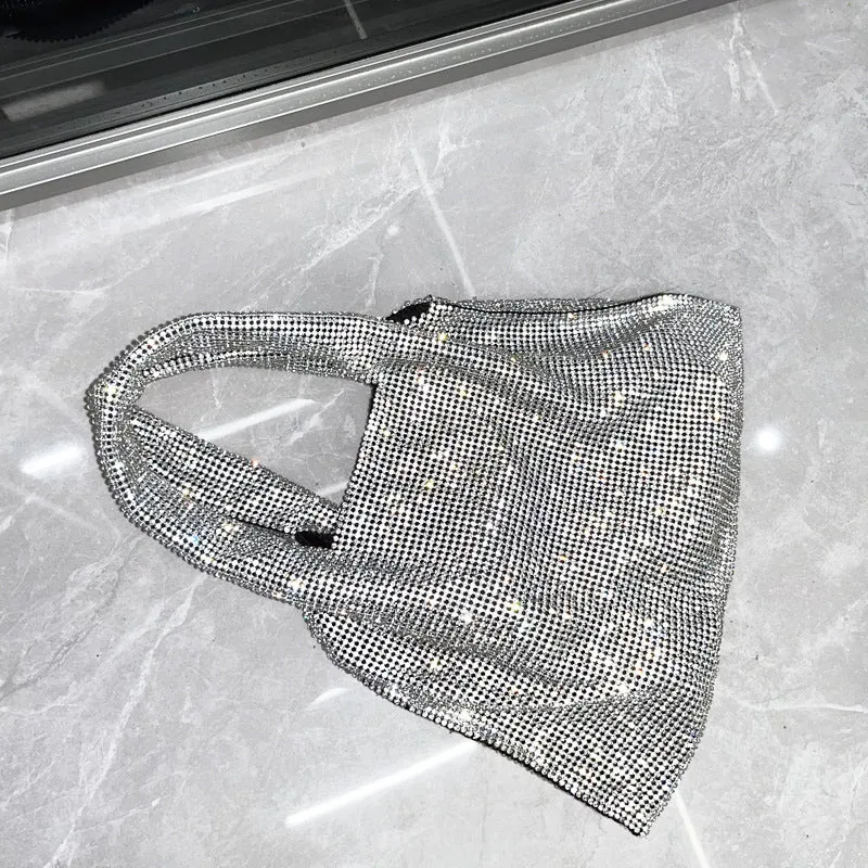 Silver evening handbag with shiny rhinestone decoration and cotton thread construction