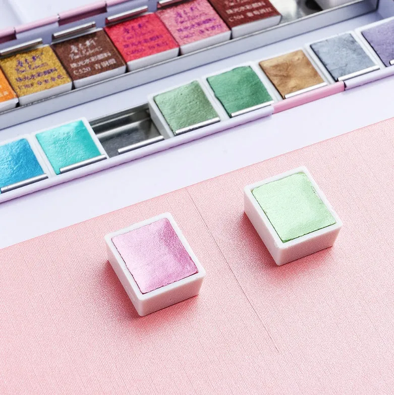 Solid watercolour paint set with pearl finish showing 12 and 24 colour options.