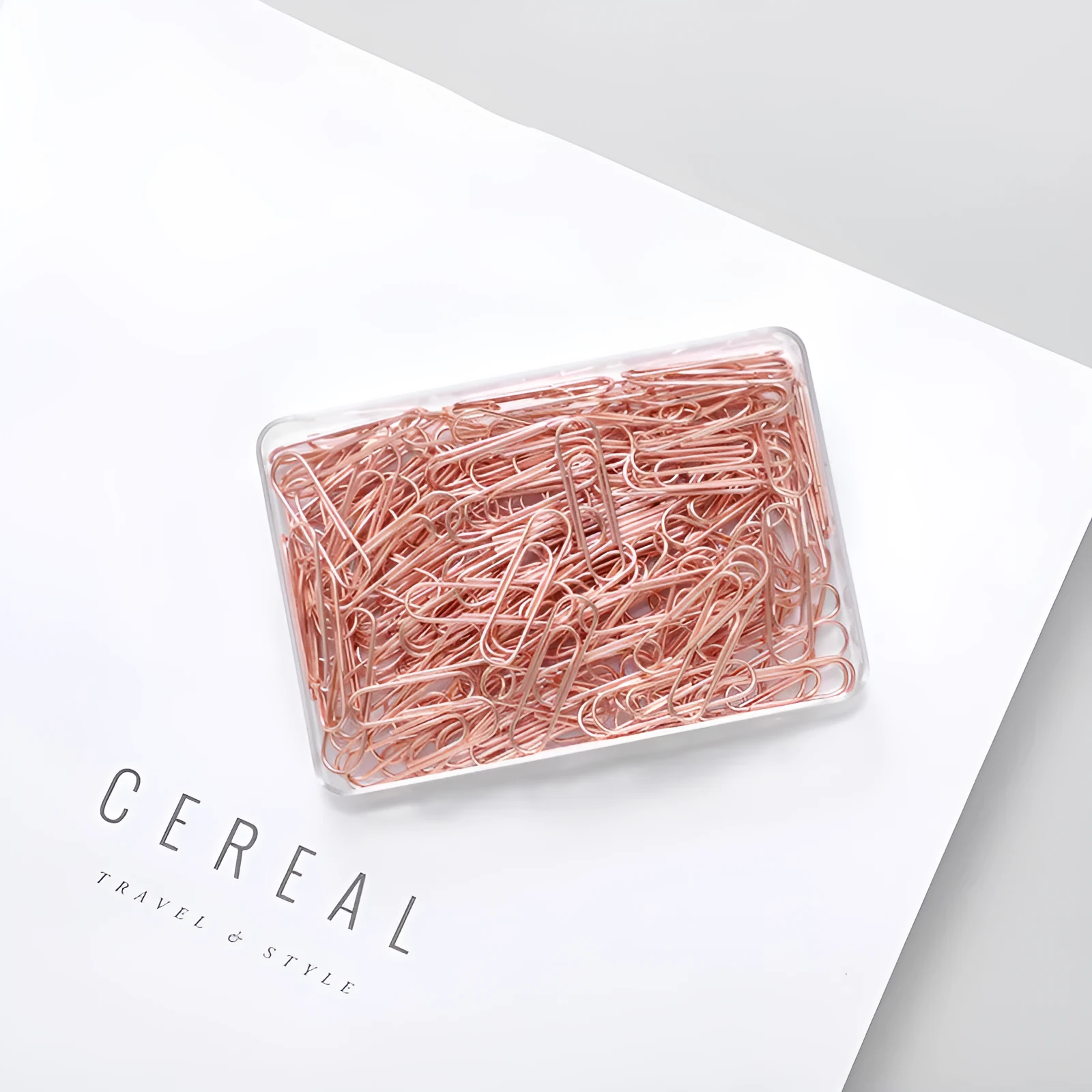 Rose gold heart-shaped paper clips with steel core construction measuring 28mm each