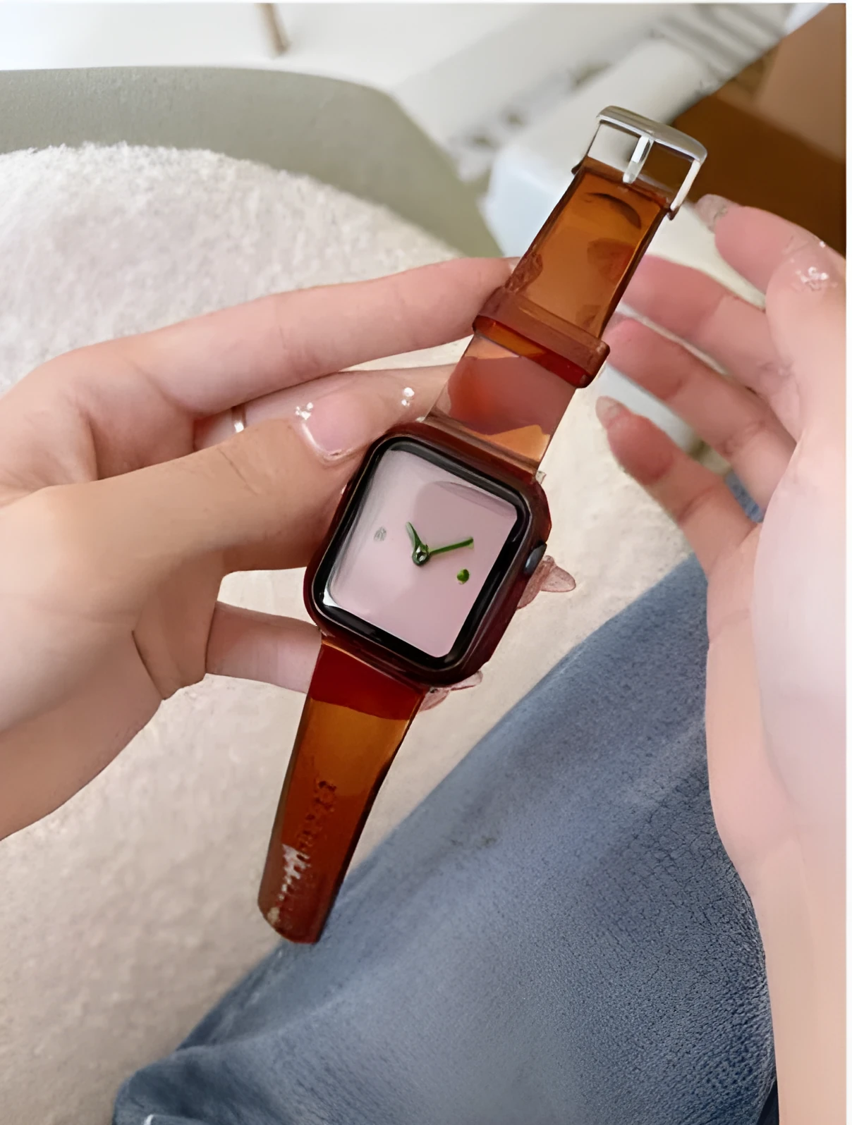 Brown transparent compatible Apple Watch replacement strap shown next to size options for 38mm to 45mm iWatch models.