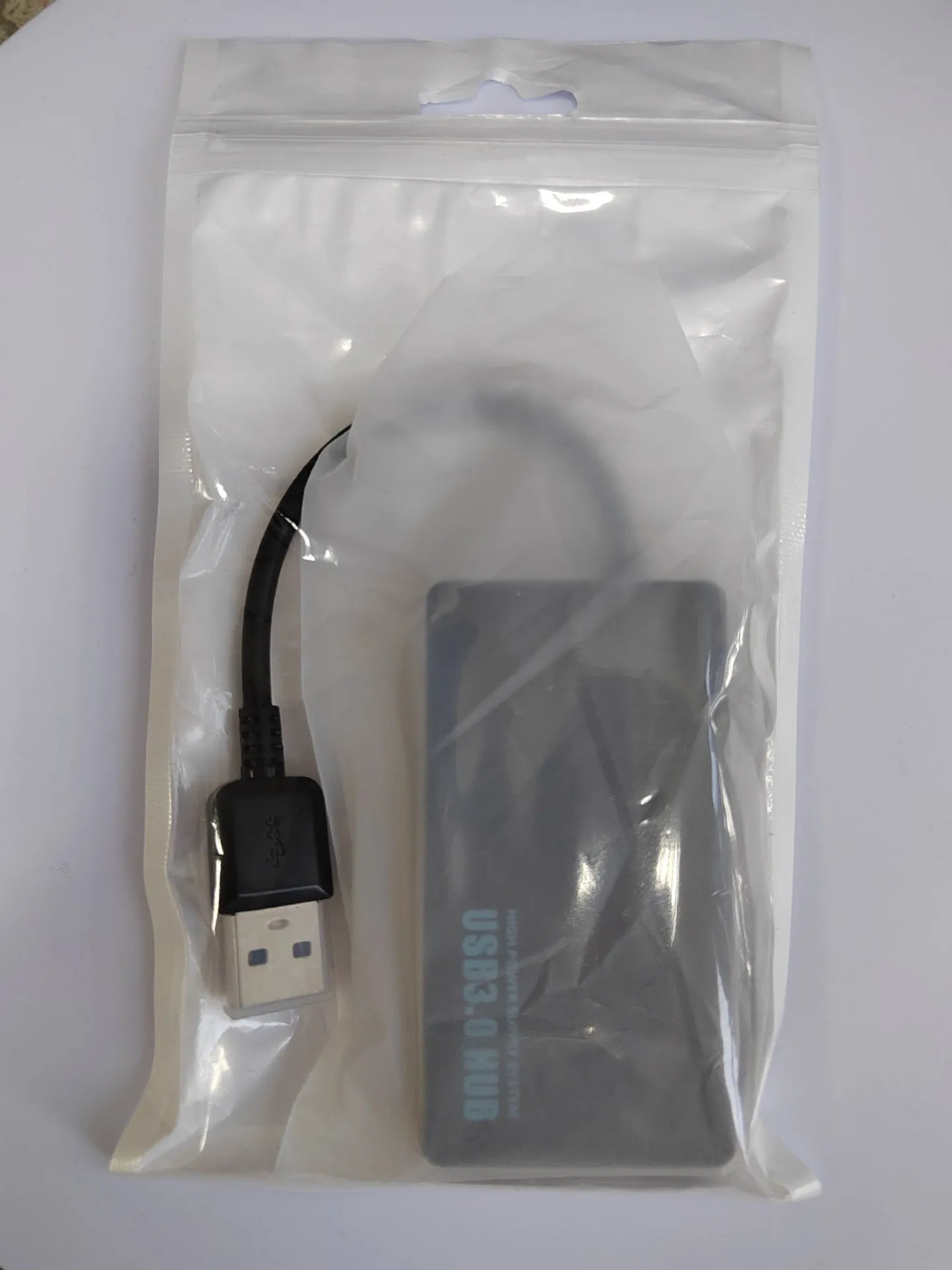 A multi-port USB extender hub with a 20cm cable, showing USB-A and USB-C style options.
