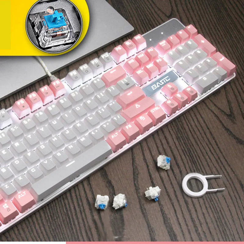 Pink mechanical keyboard with 104 keys showing USB cable and mechanical switch options
