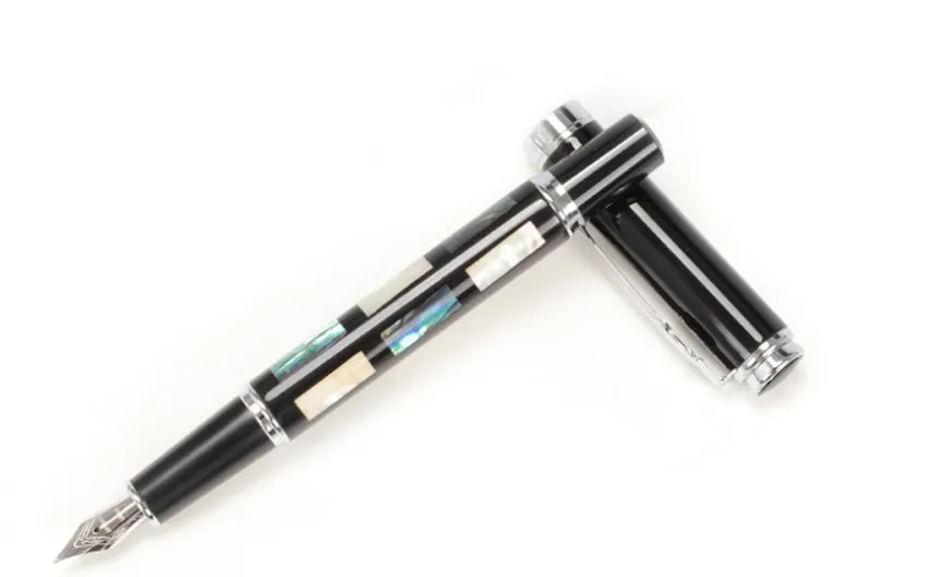 Ceramic colour lacquer pen with rotating ink system and interchangeable nib options in metal body