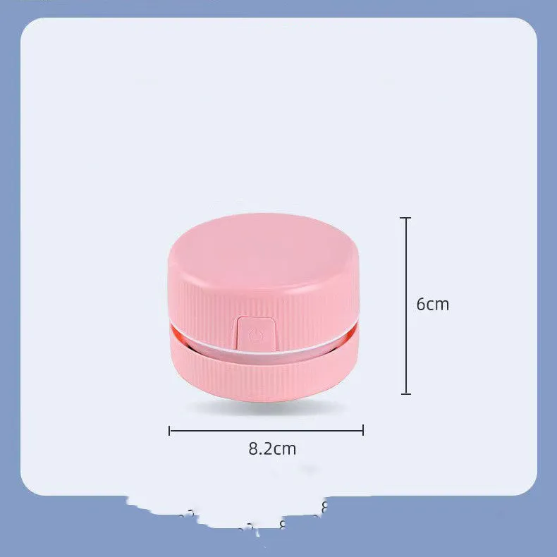 Blue mini desktop vacuum cleaner for pencil eraser chips and keyboard crumbs