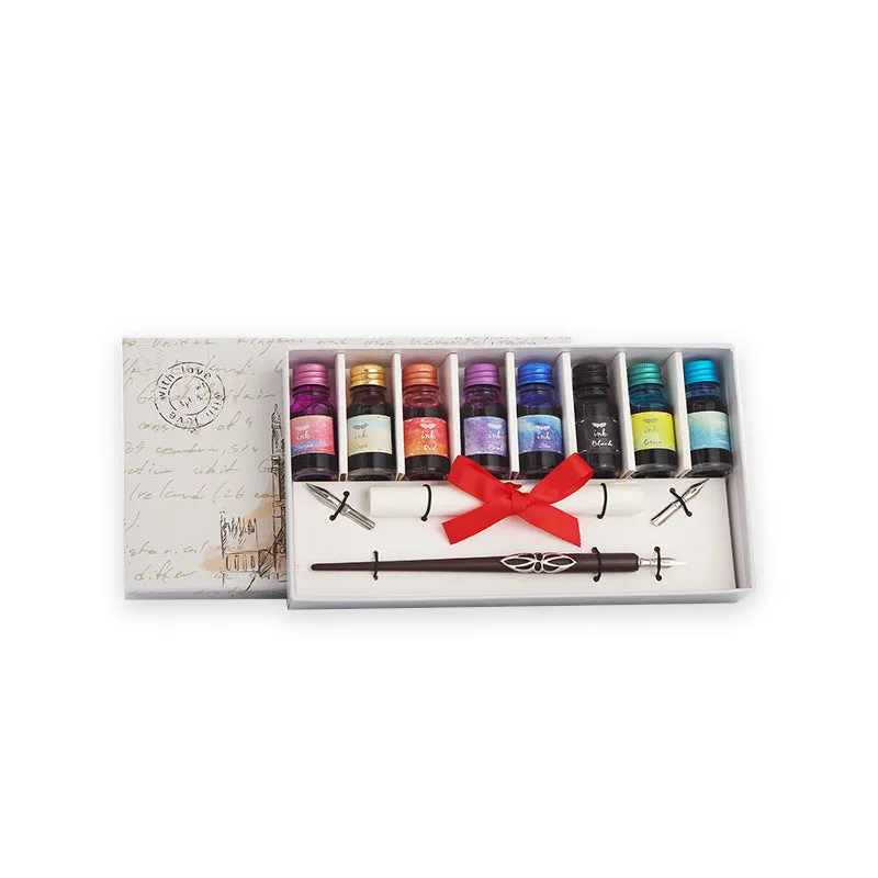 Wooden dip pen and ink calligraphy gift set with coloured ink bottles in a wooden box