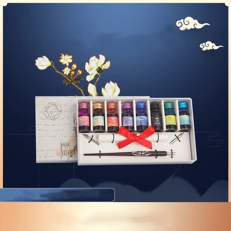 Wooden dip pen and ink calligraphy gift set with coloured ink bottles in a wooden box
