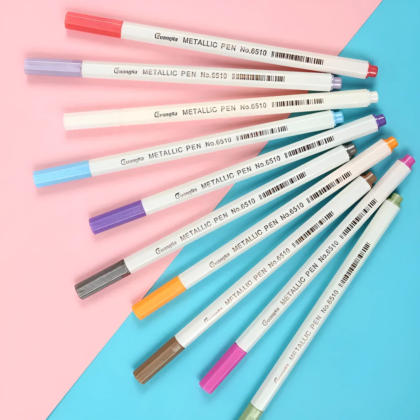 Boxed set of coloured metallic pens with plastic shells for office and stationery use.
