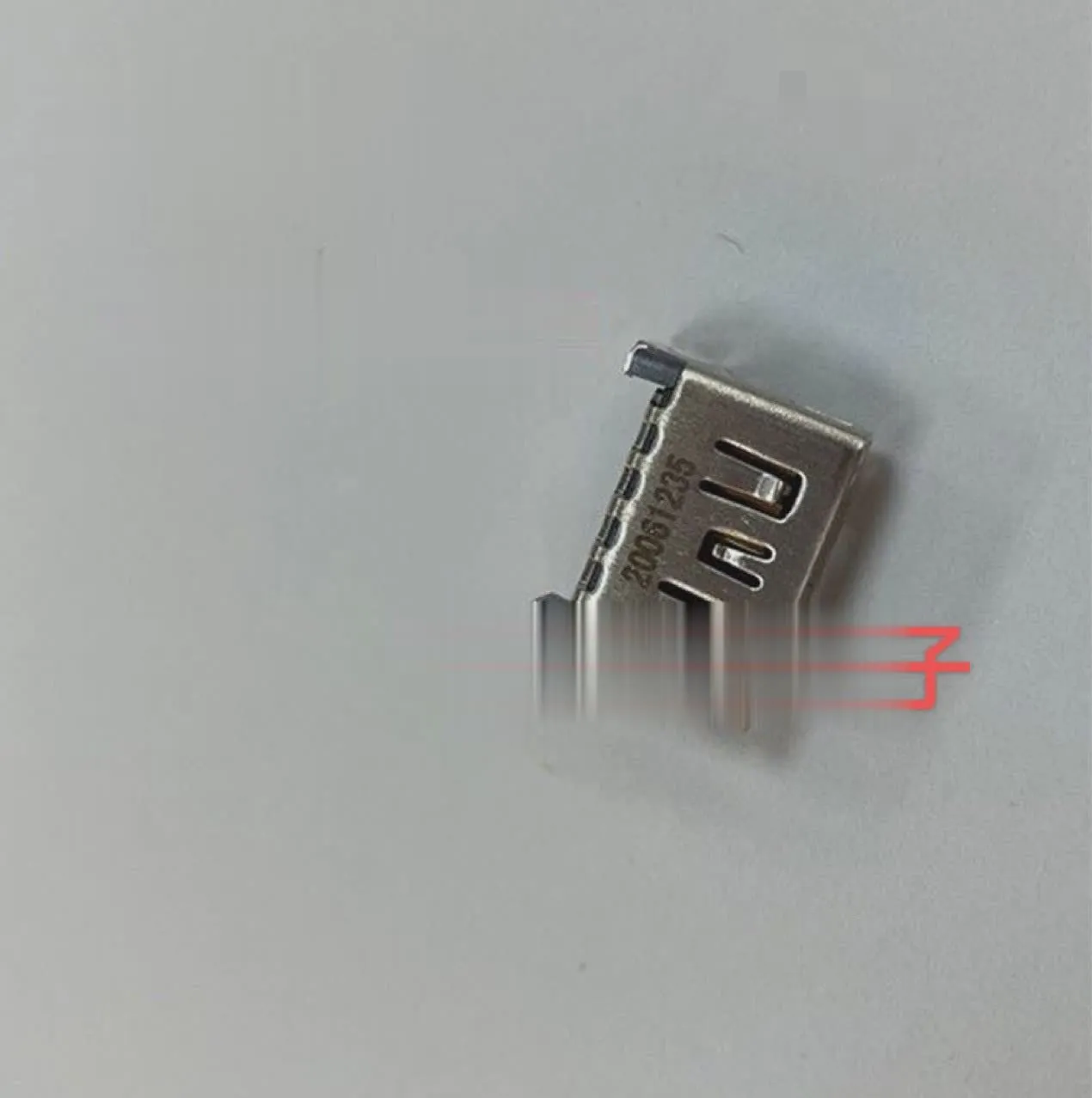 Silver metal HDMI host interface socket connector with mounting holes.
