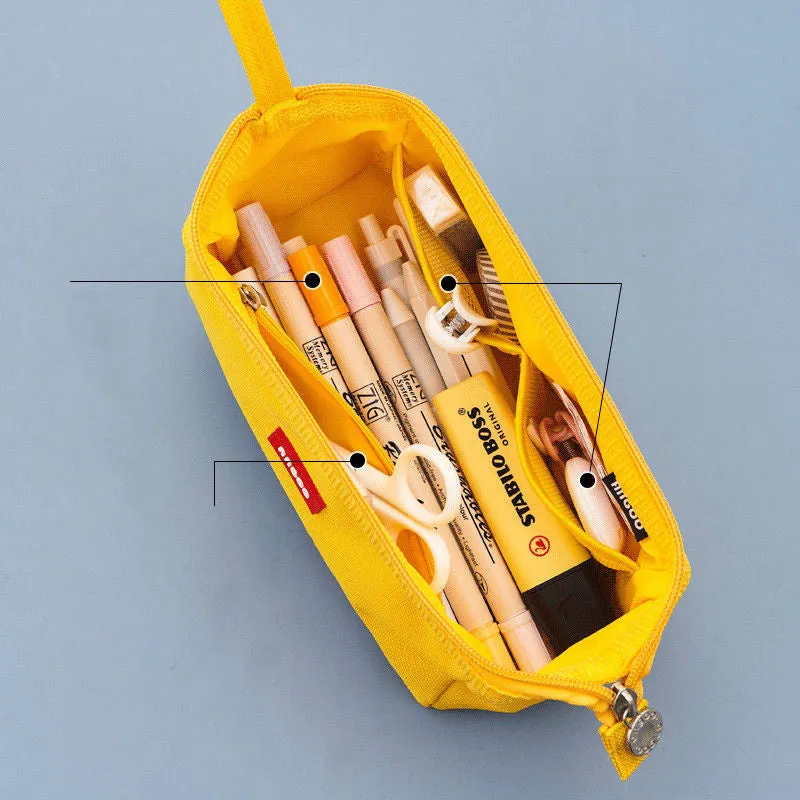 Large canvas pencil case with double zipper in yellow, black, or dark blue colour.