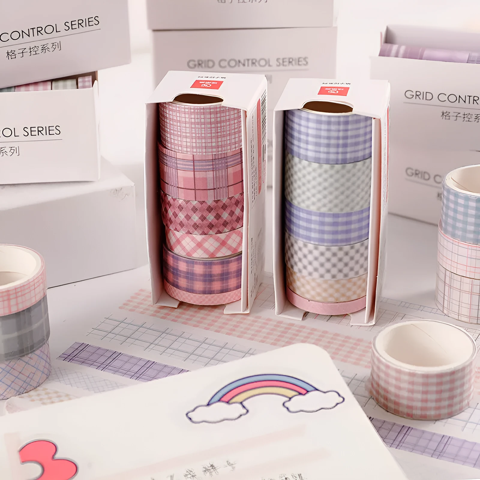 Set of six rolls of retro plaid decorative Japanese paper tape in various colours and widths.