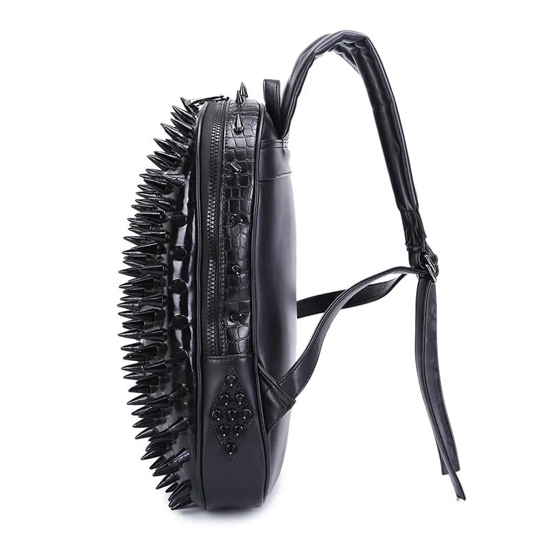 Black oval punk style women's backpack made of PU leather with air cushion straps and open pockets.