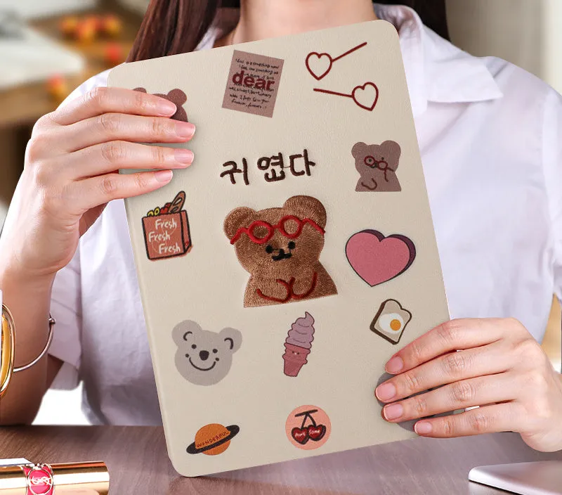 Cartoon design silicone protective sleeve for iPad with imitation leather finish and included screen protector.