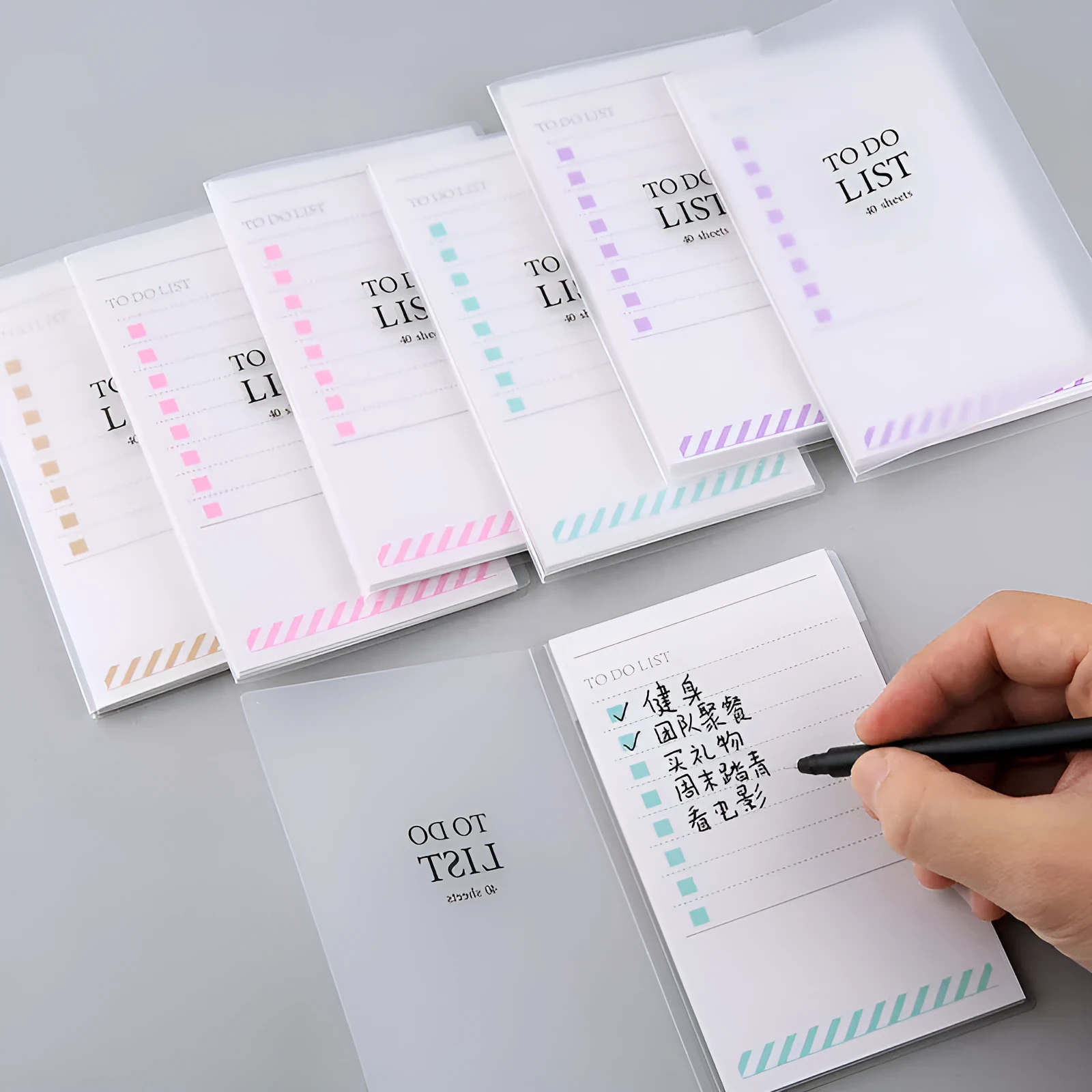 Yellow, green, and purple A6 tearable notebooks with frosted PP covers, showing size of 13 by 8 cm