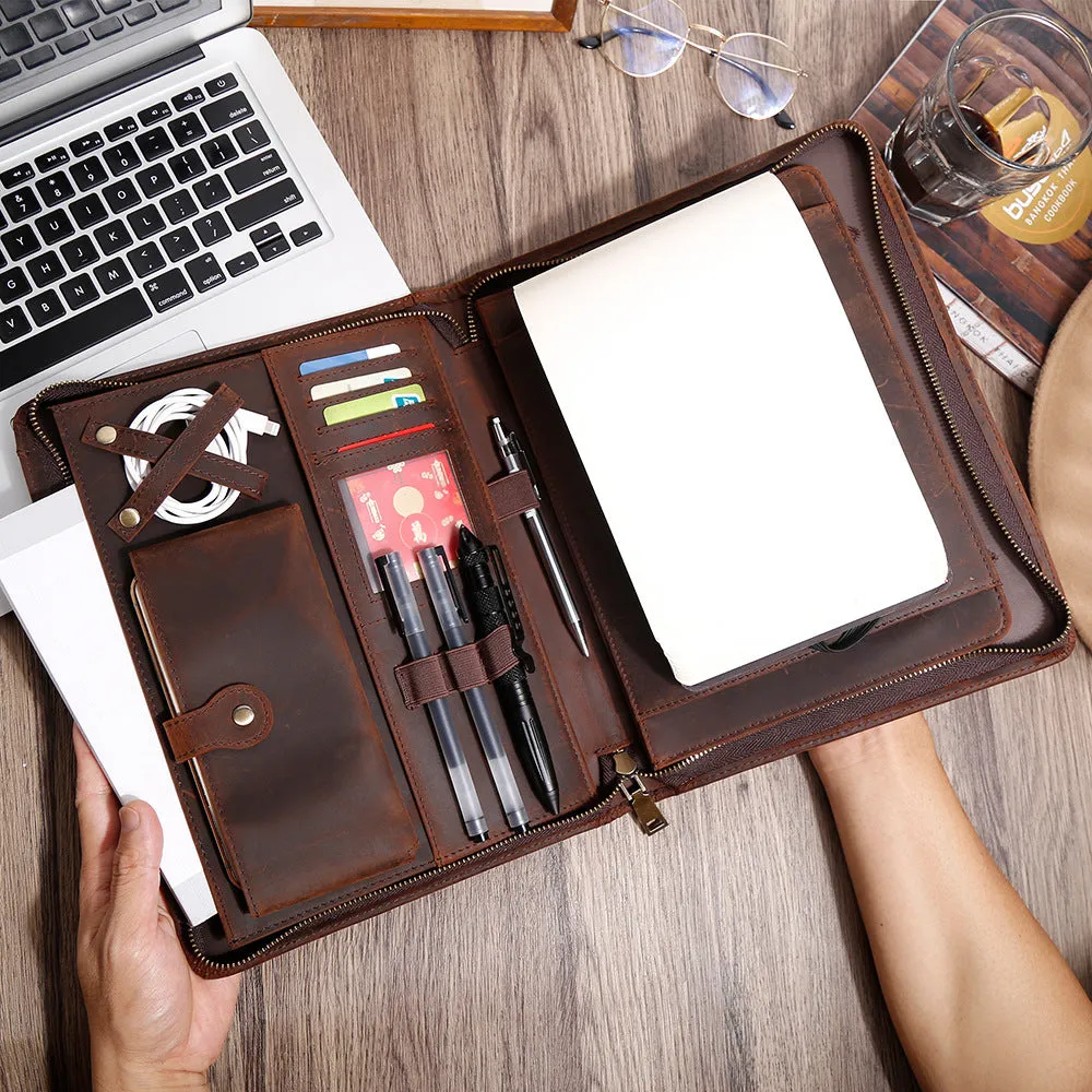 Genuine cowhide leather computer protective case with organisational compartments.