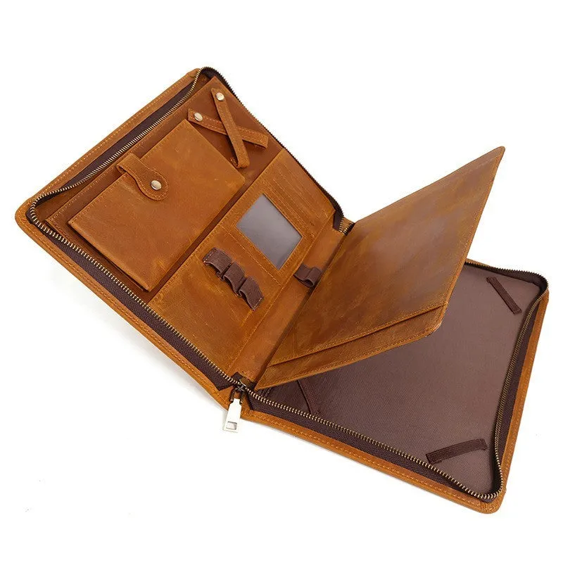 Genuine cowhide leather computer protective case with organisational compartments.
