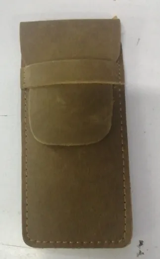 Brown vintage leather pencil case measuring 16x6cm open showing interior