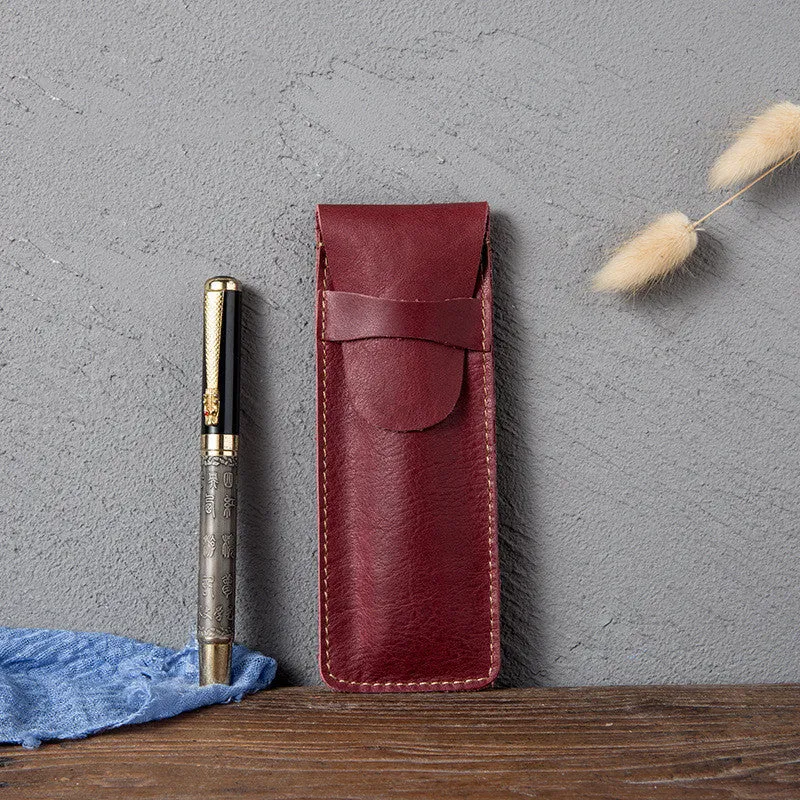 Brown vintage leather pencil case measuring 16x6cm open showing interior