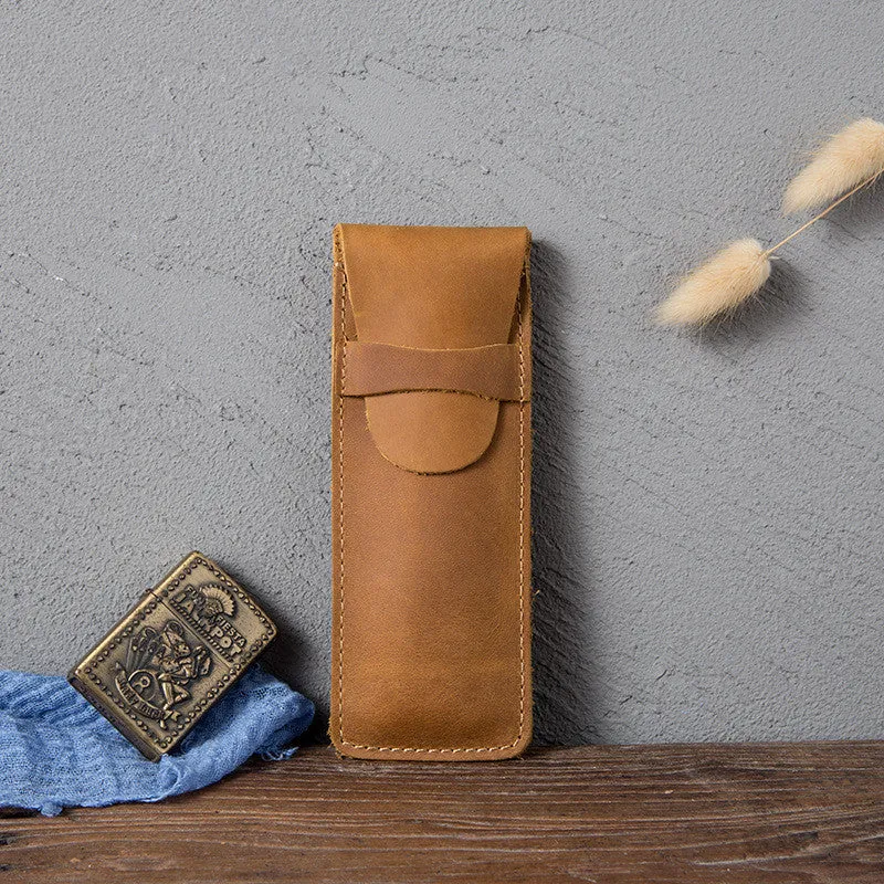 Brown vintage leather pencil case measuring 16x6cm open showing interior