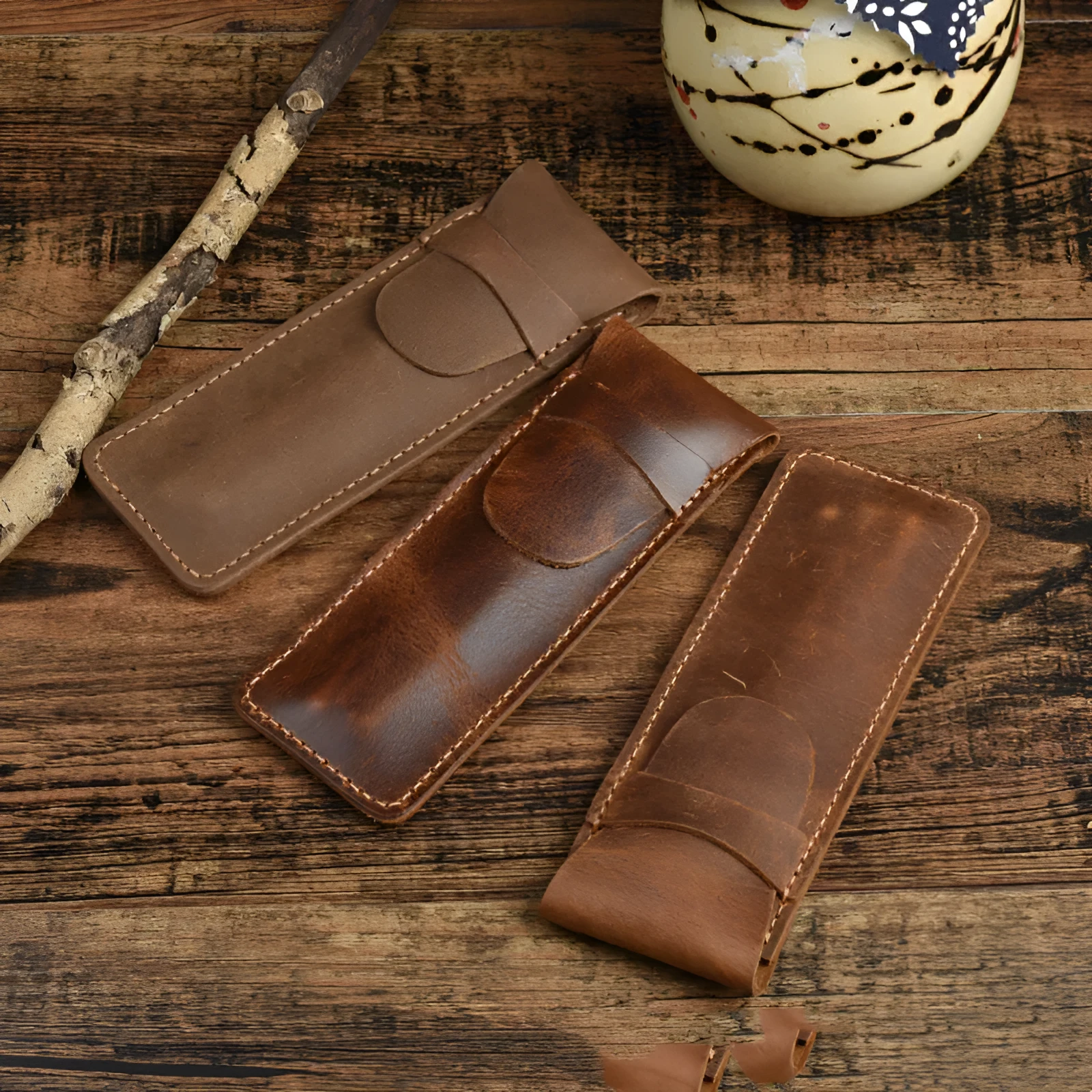 Brown vintage leather pencil case measuring 16x6cm open showing interior