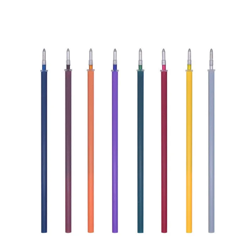 Set of Shiny Metal Quicksand gel pens in assorted metallic and pearlescent colours on dark paper.
