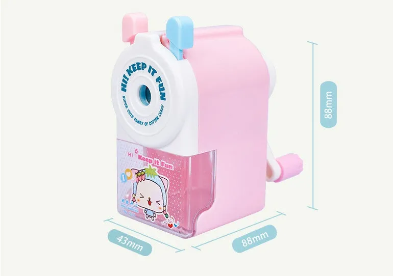 Cartoon-shaped manual pencil sharpener in blue, green, pink, or purple plastic.