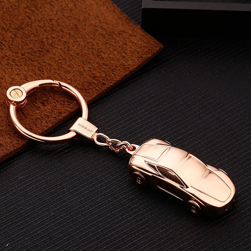 Heart-shaped zinc alloy metal keychain showing multiple colour finish options including black ice and colourful variants