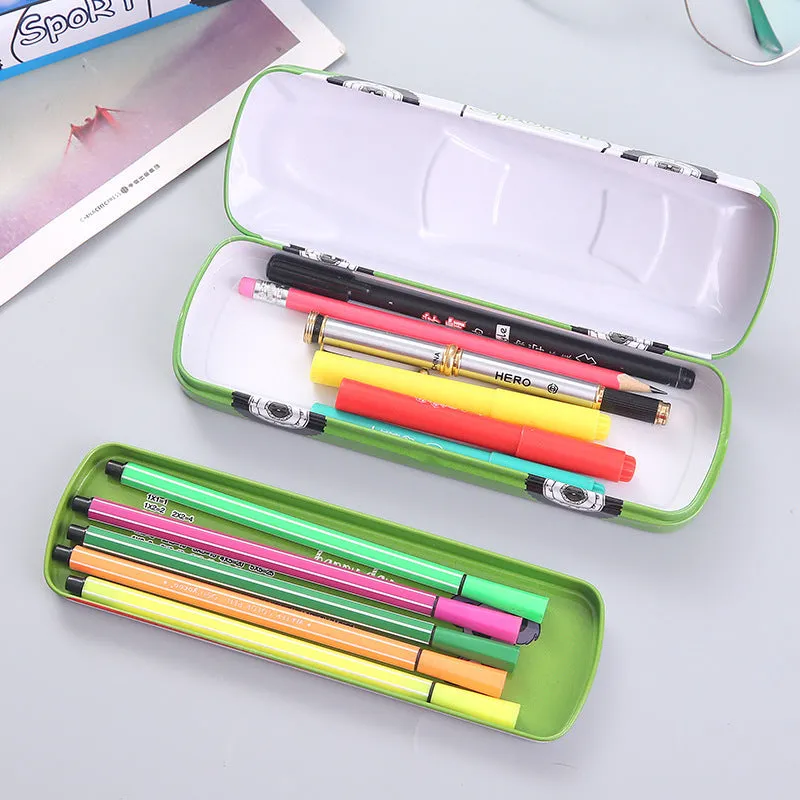 Metal tinplate stationery box with racing car trolley cartoon pattern, shown closed.