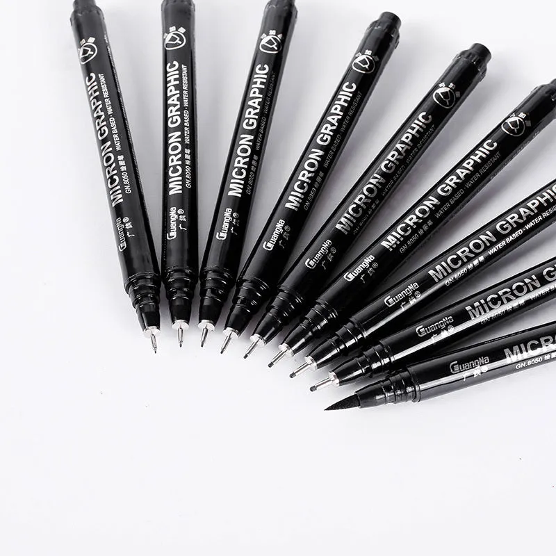 Set of 12 black comic drawing pens with various nib sizes stored in a fabric organiser bag.