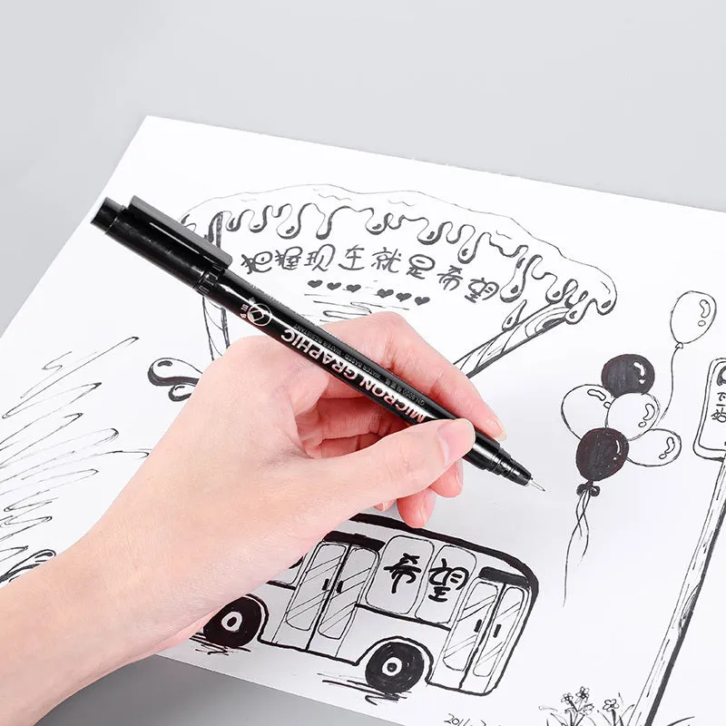 Set of 12 black comic drawing pens with various nib sizes stored in a fabric organiser bag.