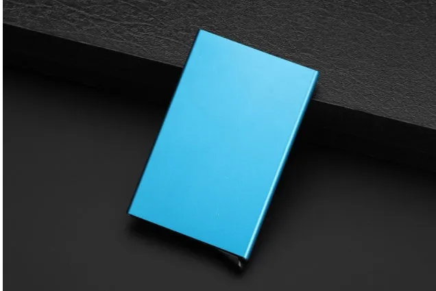 Aluminum geometric business card holder in six colours with stainless steel construction showing compact dimensions