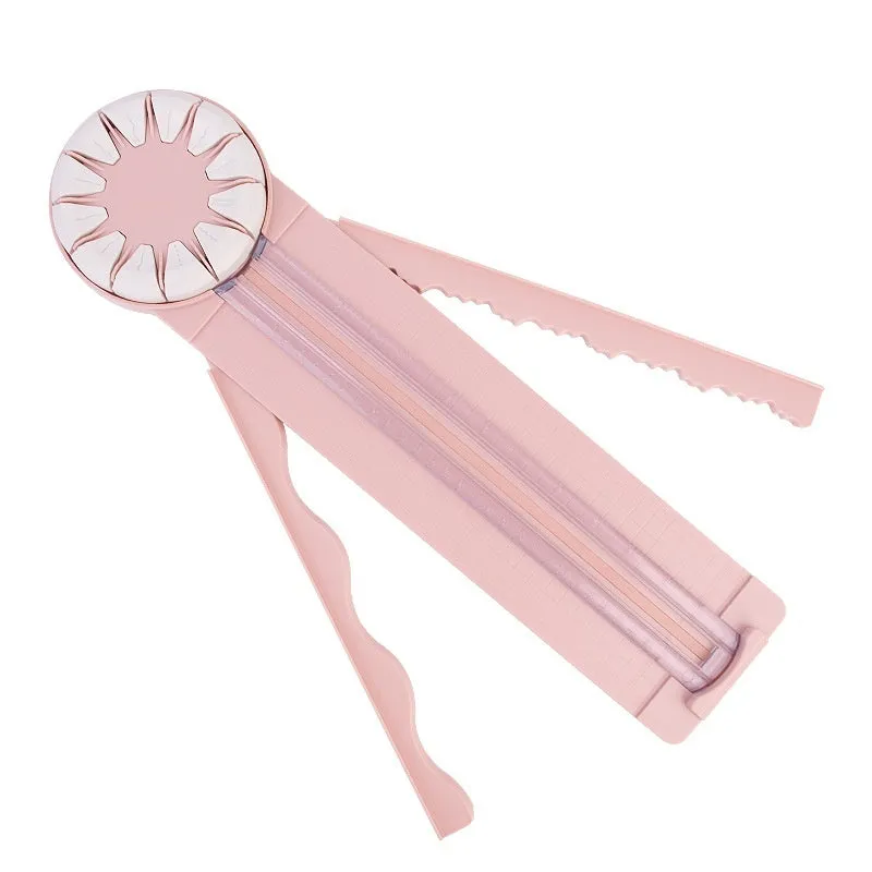 Pink and black 12-in-1 multifunctional plastic paper cutting machine for crafts.