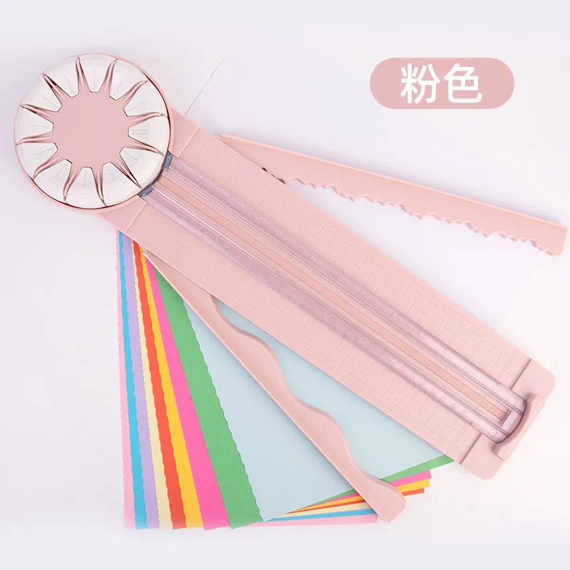 Pink and black 12-in-1 multifunctional plastic paper cutting machine for crafts.