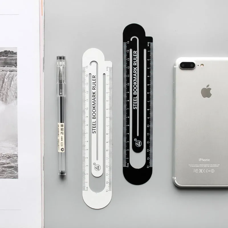 Black and white two-sided metal ruler showing 12 cm length scale.