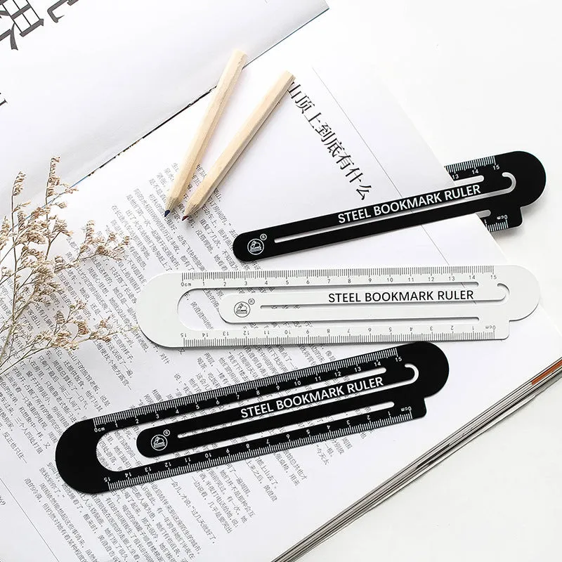 Black and white two-sided metal ruler showing 12 cm length scale.