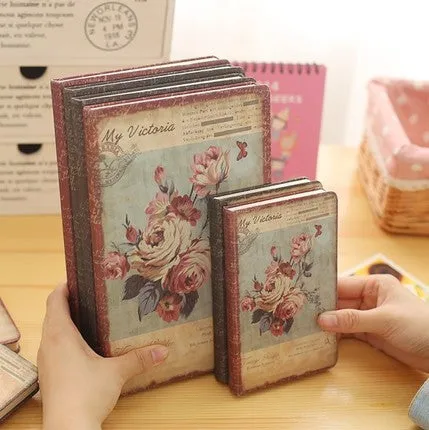 Hardcover notebook with retro floral cloth cover in Lily colour, showing 25K size next to 50K size comparison