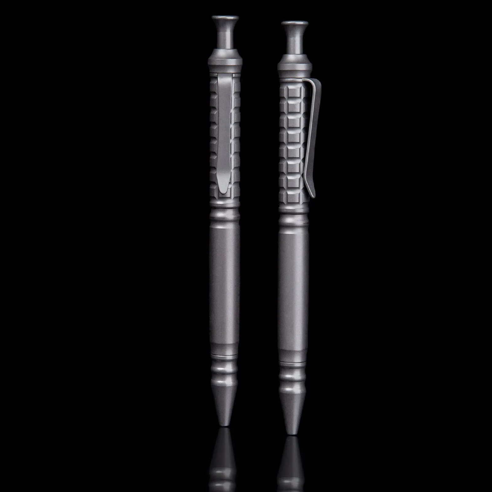 Gunmetal grey titanium tactical pen with push-action mechanism and 0.5mm nib