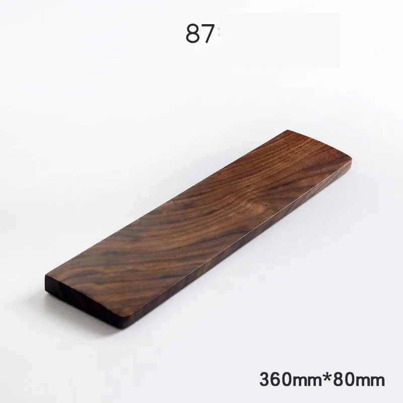 Walnut wood mechanical keyboard wrist rest showing natural wood grain